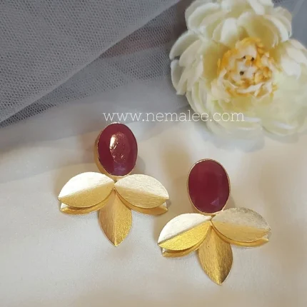 Double layered petals with maroon stone studs