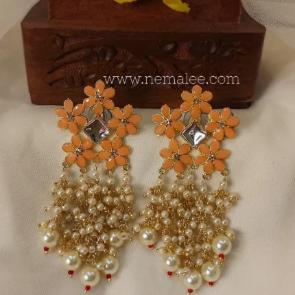 Pushpa dhara  earrings in pastel orange