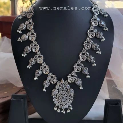 Silverlookalike white stone studded long haram