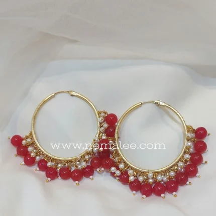 Round beads and pearl hoops in red
