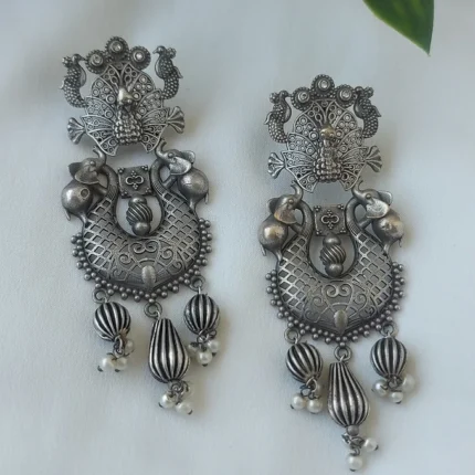 Peacocok silver lookalike earrings